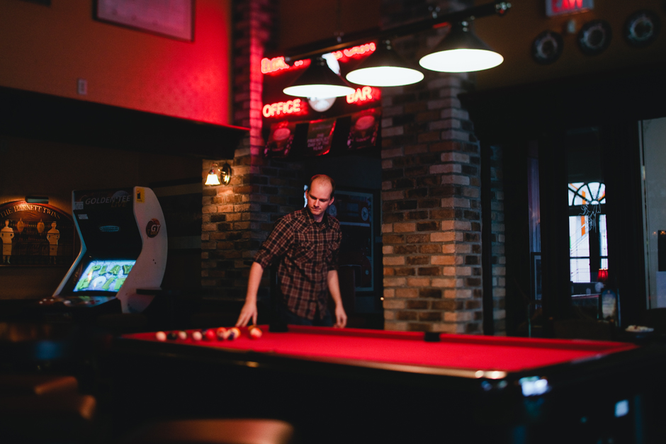 Toronto Engagement Photographer: getting ready to play pool