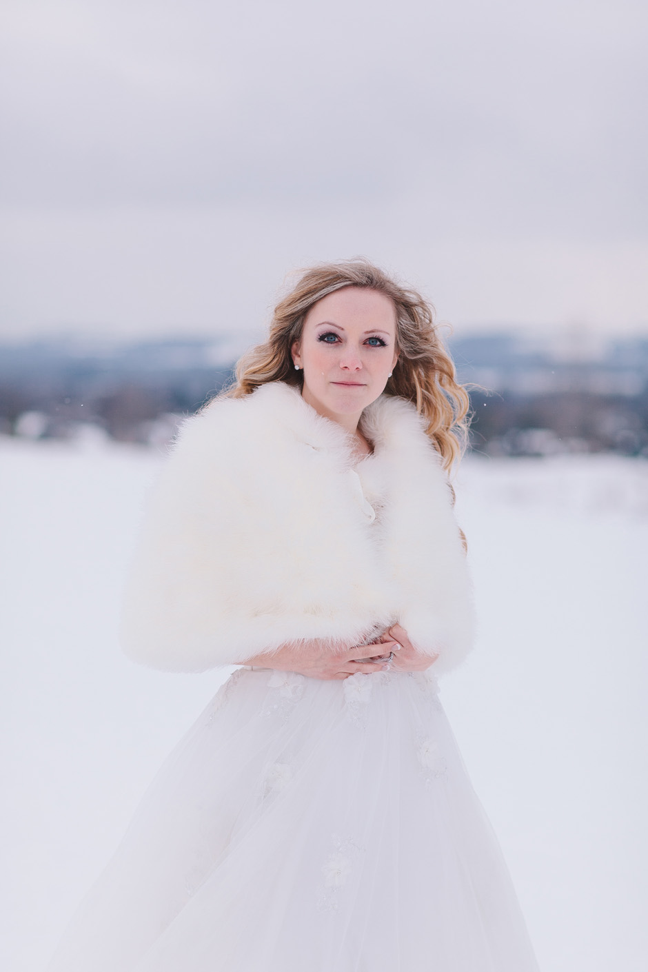 Toronto Wedding Portrait photographer taking photo of Bride during the winter