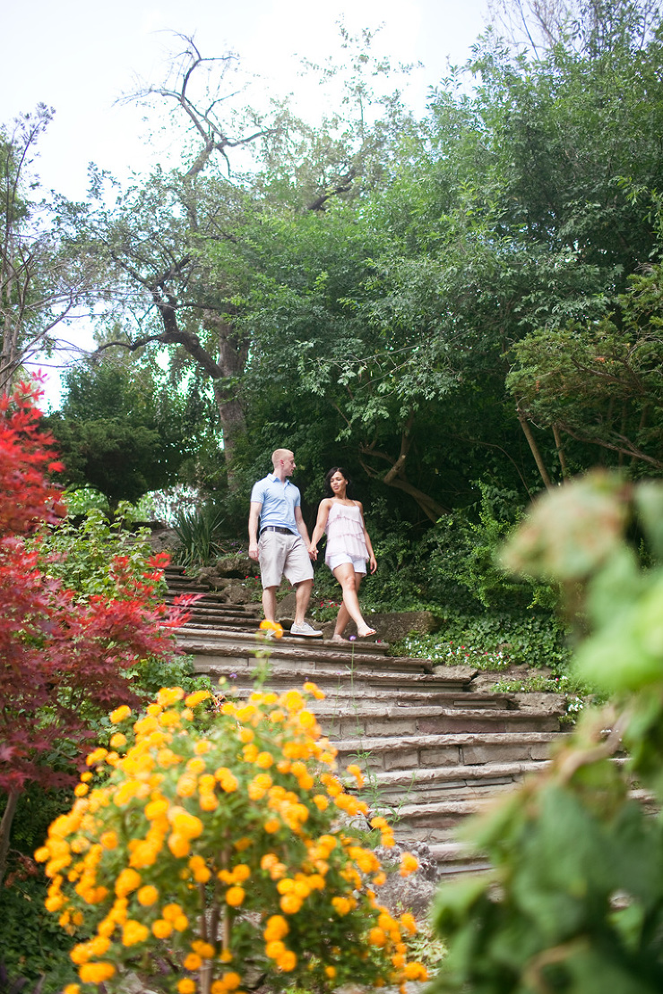 Toronto Couples Photographer : couple walking down stairs in Edwards Gardens