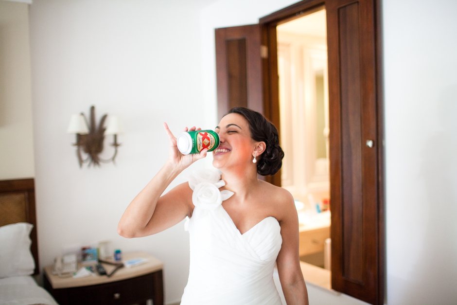 Destination Wedding Photographer : Rana Srouji Arguera enjoying a beer on her wedding day