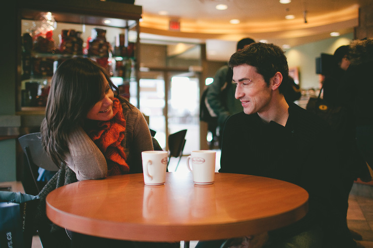 Photojournalistic Engagement Photographer in Toronto : couple enjoying coffee at Tim Horton