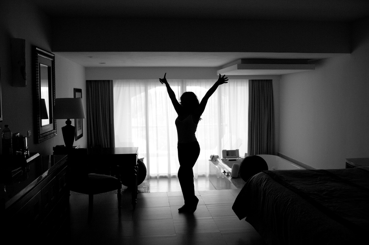 silhoutte of wife in hotel room