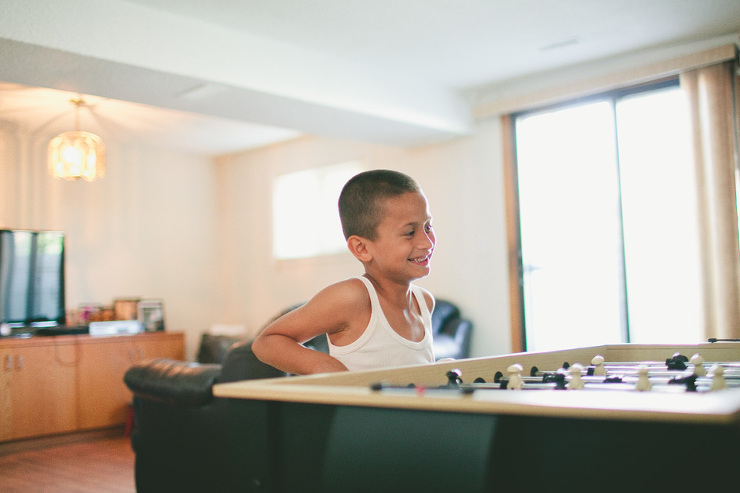 Toronto Documentary photography : playing foosball