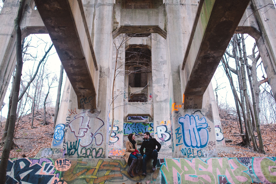 Portraits by a bridge with graffiti in Toronto
