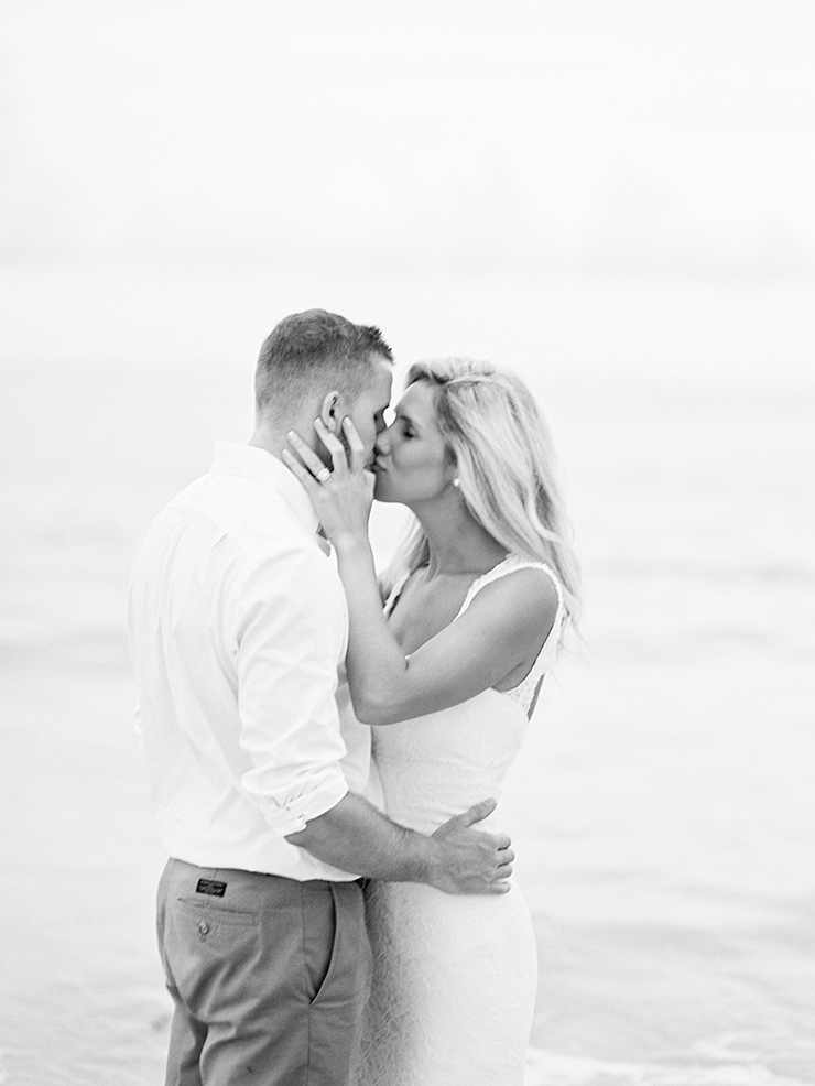 Love at Trash the Dress session on beach by Toronto wedding photographer