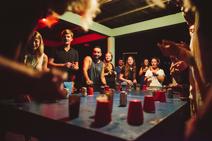 Flip Cup at Surfing Turtle Lodge Drinking Game
