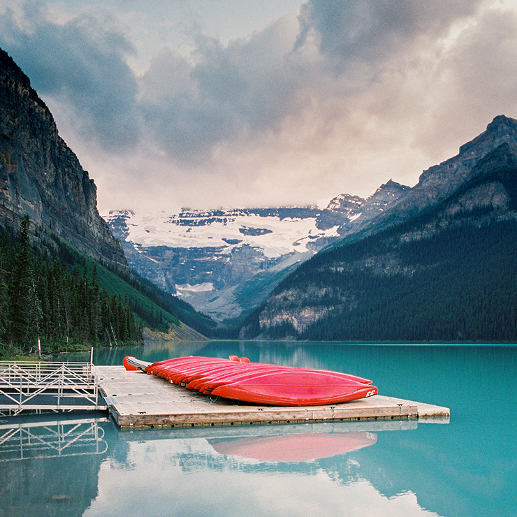 Red canoes at Lake Louise Contax G2 Fuji 400H film The Find Lab